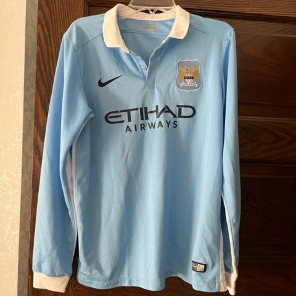 Boys Man City Sporty- long sleeve Nike shirt-size M